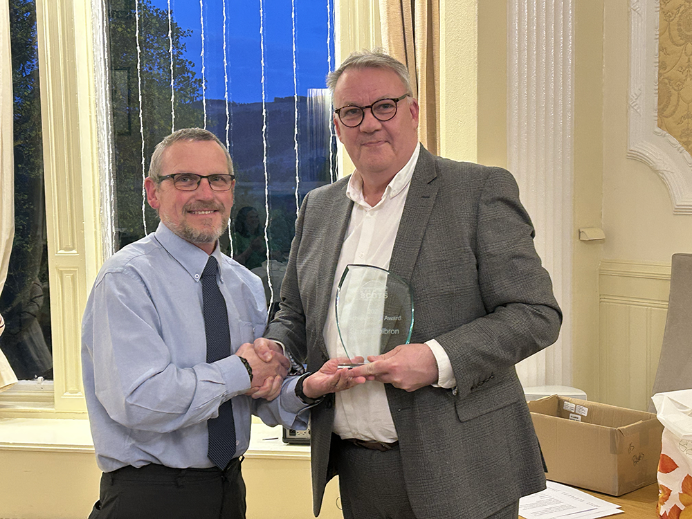 Stuart Colbron receives the SCOTS Achievement Award