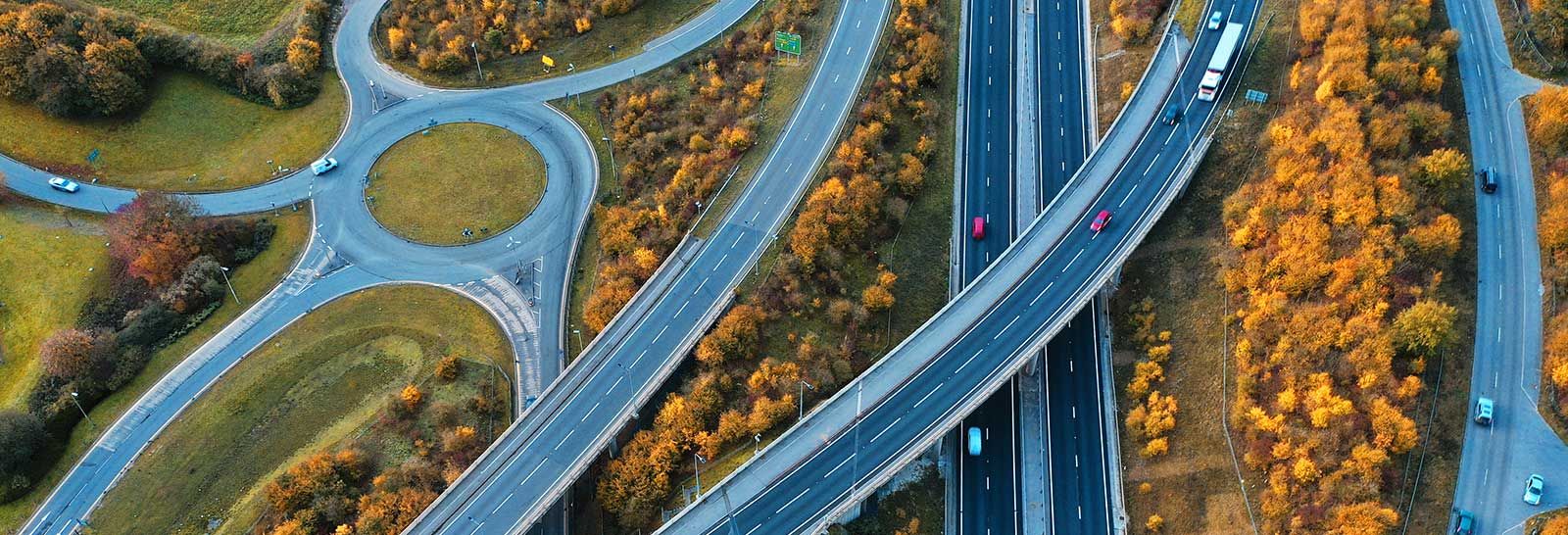 Aerial photo of motorways above a roundabout banner image