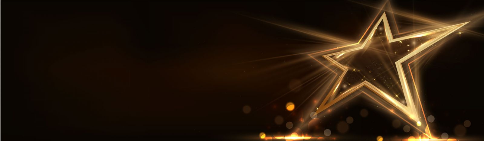 Gold star and golden lights shimmering on a black backgroud banner image